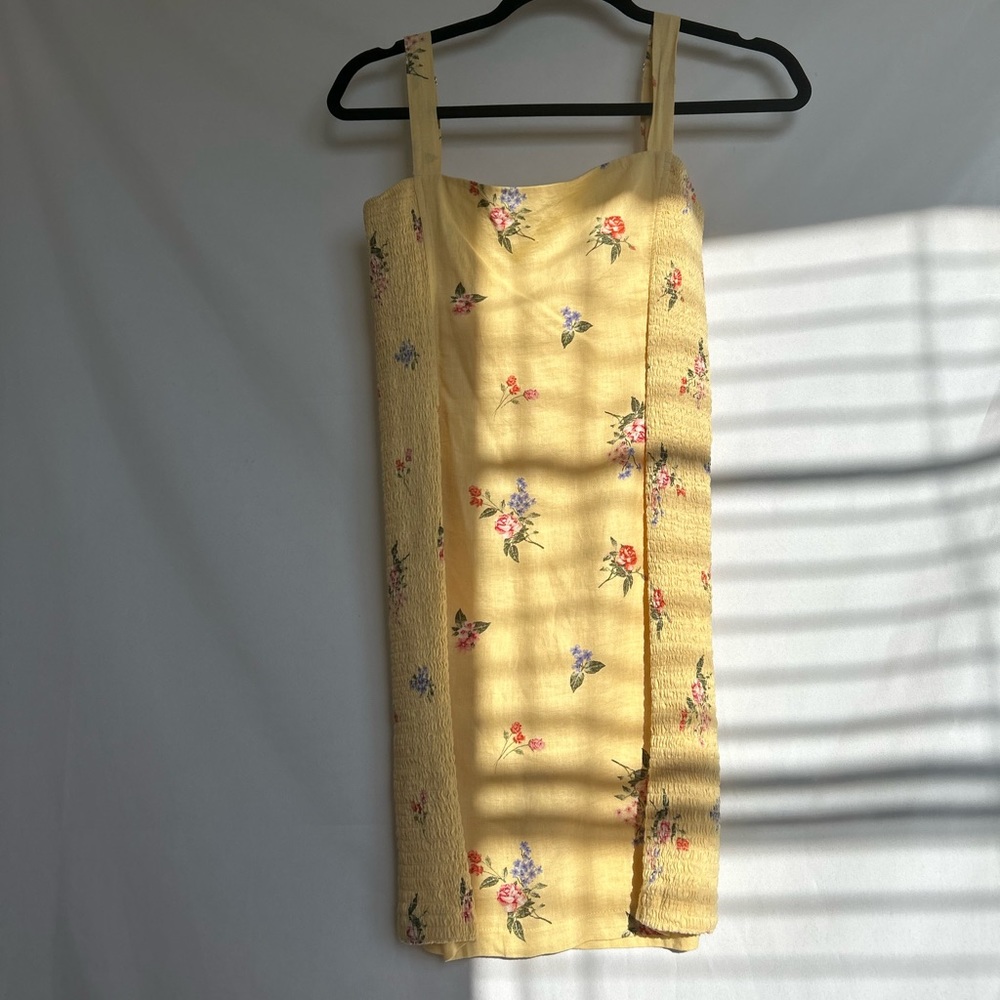 Yellow floral print dress.